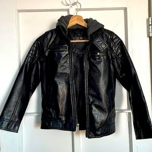 Black faux leather Urban Republic jacket marketed for boys. Grey fabric hoodie.